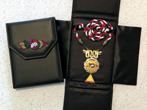 Jewel Case With Embroidered Q Emblem